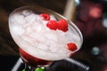 Raspberry daiquiri, alcoholic cocktail with white rum, lime juice, raspberries and crushed ice in tall glass, on wooden bar Royalty Free Stock Photo