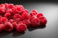 Raspberry fresh berries closeup, ripe fresh organic Raspberries over black background, macro shot