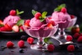 Raspberry ice cream in a colorful cup, appetizing, with delicious strawberries and blueberries Royalty Free Stock Photo