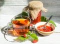 Raspberry jam and tea in cup Royalty Free Stock Photo