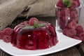 Raspberry Jello with fresh fruits Royalty Free Stock Photo