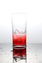 Raspberry lemonade with lce cubes in a glass