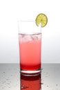 Raspberry lemonade with lime in a glass Royalty Free Stock Photo