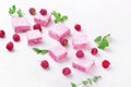Raspberry marshmallow on the white table Royalty Free Stock Photo
