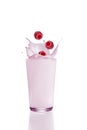 Raspberry milk shake in glass,splashing