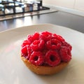 raspberry mini cake, tartlet on a table, close-up. Italian Cuisine Royalty Free Stock Photo