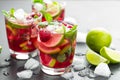 Raspberry mojito cocktail with lime, mint and ice, cold refreshing drink Royalty Free Stock Photo