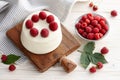 Raspberry mousse cake on wooden board Royalty Free Stock Photo