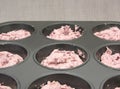 Raspberry muffins in a muffin cake pan