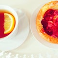 Raspberry pastry and cup of tea