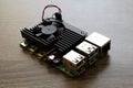 Raspberry Pi Microcomputer 4B with a black heatsink for Electrical Engineering prototyping Royalty Free Stock Photo