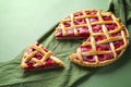 Raspberry pie with a lattice crust. One slice of raspberry tart Royalty Free Stock Photo