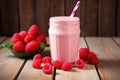 raspberry protein shake with fresh raspberries on a wooden table