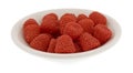 Raspberry shaped candy in a small bowl Royalty Free Stock Photo