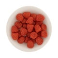 Raspberry shaped candy in a small bowl Royalty Free Stock Photo