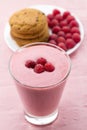 Raspberry smoothie with berries on wooden background. Healthy vegetarian food Royalty Free Stock Photo