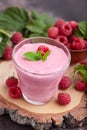 Raspberry smoothie in glass jar. Healthy refreshed homemade beverage.