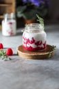 Raspberry smoothie, milkshake in a glass jar on a dark wooden background. Natural summer detox drink. Healthy eating concept Royalty Free Stock Photo