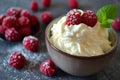 raspberry with a soft texture and a red color in a bowl with cream