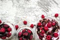 Raspberry yogurt dessert with fresh berries, chocolate and granola in glasses Royalty Free Stock Photo