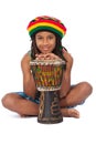 Rasta kid sitting on the floor Royalty Free Stock Photo