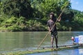 Rastafari rafting on bamboo raft on Rio Grande, Port Antonio, Jamaica