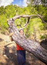 Rastafarian girl on a walk in a rocky forest Royalty Free Stock Photo