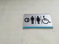 Toilet sign disable wrong direction Royalty Free Stock Photo