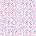 Seamless floral background with a pattern of different small flowers in pastel colors.