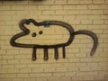 A rat graffiti on the wall