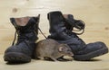 Rat and old military boots. Royalty Free Stock Photo