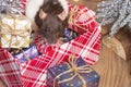 Rat is a symbol of the new year.Gray rat looks at gift boxes.Funny little rat in a gift box. Symbol of the year 2020