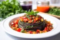 ratatouille served on a round white plate