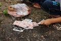 Ratchaburi, Thailand - April 4, 2017 : Burning of fake money made from paper materials during Chinese Qing ming Festival or Tomb S