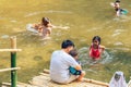 RATCHABURI THAILAND-JANUARY 19,2020 : Unidentified people come to visit, relax and swim in the stream at Ohpoi Market on january19 Royalty Free Stock Photo