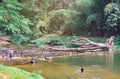 RATCHABURI THAILAND-JANUARY 19,2020 : Unidentified people come to visit, relax and swim in the stream at Ohpoi Market on january19 Royalty Free Stock Photo