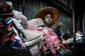 Ratchaburi, Thailand - July 26, 2014: Selling hats at Damoen Sad