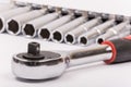 Ratchet with sockets blurred background Royalty Free Stock Photo