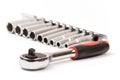 Ratchet with sockets blurred background Royalty Free Stock Photo