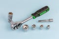Ratchet wrench with different hexagonal sockets and adapters Royalty Free Stock Photo