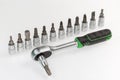 Ratchet wrench with inserted torx shape bit, interchangeable bits set Royalty Free Stock Photo