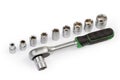 Ratchet wrench and set of hexagonal sockets different sizes Royalty Free Stock Photo