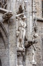 Rathaus New Town Hall close-up in Munich, Germany, Europe. Detail of Gothic building wall with statues and gargoyles Royalty Free Stock Photo