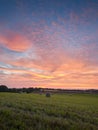 Ratingen, Germany - Beautiful sunset in the Bergisches Land region. Meadow in straw bales. Rural landscape Royalty Free Stock Photo