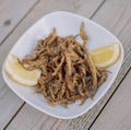 Ration of anchovies, typical Spanish fried fish.