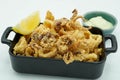 Ration of fried calamari typical of a Spanish tapas bar Royalty Free Stock Photo