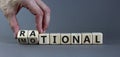 Rational or emotional symbol. Psychologist turns wooden cubes and changed the word `rational` to `emotional`. Beautiful grey