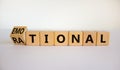 Rational or emotional symbol. Turned wooden cubes and changed the word `rational` to `emotional`. Beautiful white background.