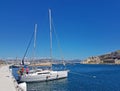 Ratonneau Island / France - may 8, 2017: Crew of sailingboat prepare our yacht to sailing. Litle yacht mooring near the pier in fr Royalty Free Stock Photo