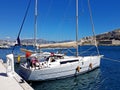 Ratonneau Island / France - may 8, 2017: Crew of sailingboat prepare our yacht to sailing. Litle yacht mooring near the pier in fr Royalty Free Stock Photo